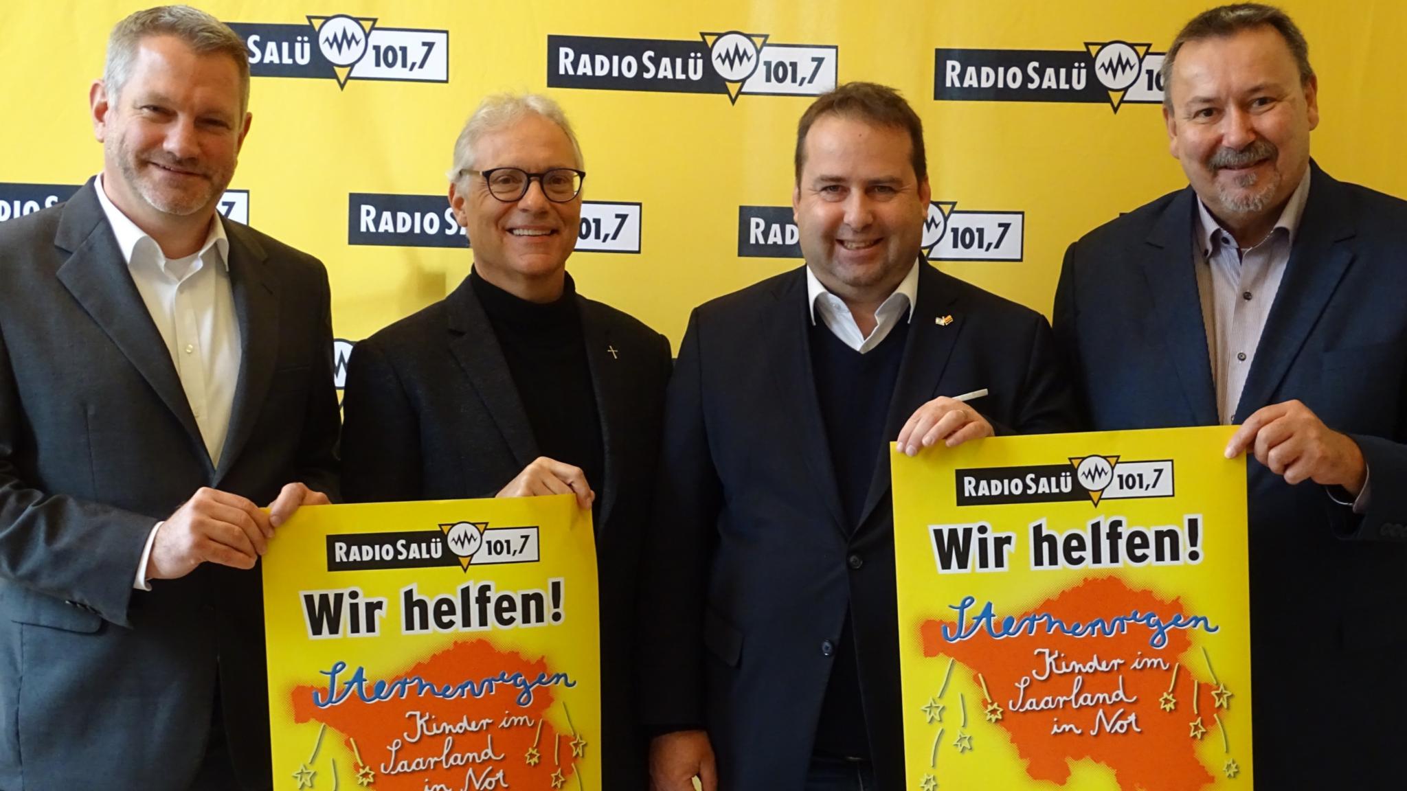 v.l.n.r. Caritasdirektor Michael Schley, Pfarrer Wolfgang Glitt, Sozialminister Dr. Magnus Jung, Radio-Salü-Geschäftsführer Axel Musolff