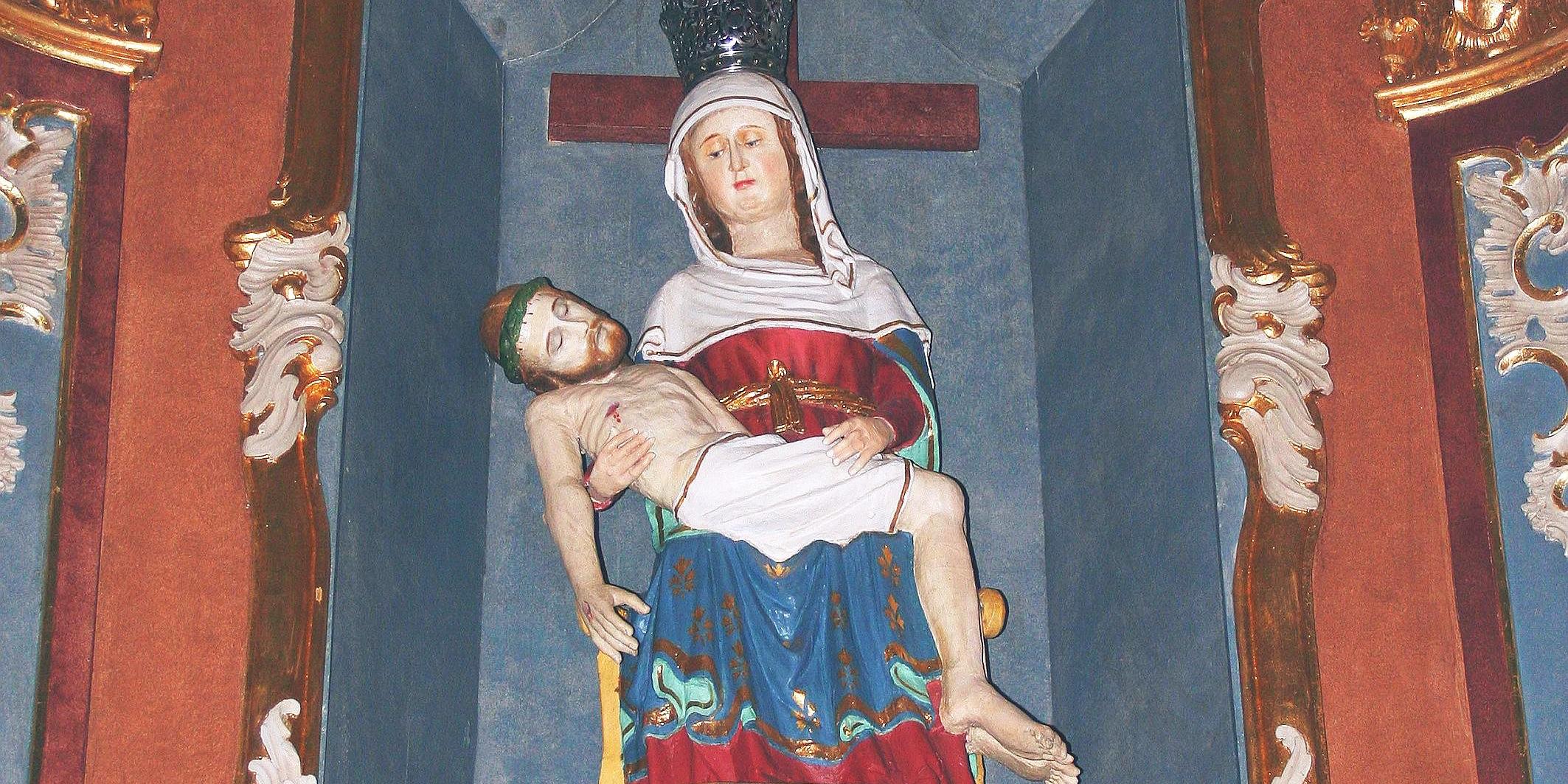 Seit vielen  Jahrhunderten wird im Eifelort Weidingen ein spätgotisches Gnadenbild der trauernden Gottesmutter verehrt, die auf ihrem Schoß den toten Jesus trägt.