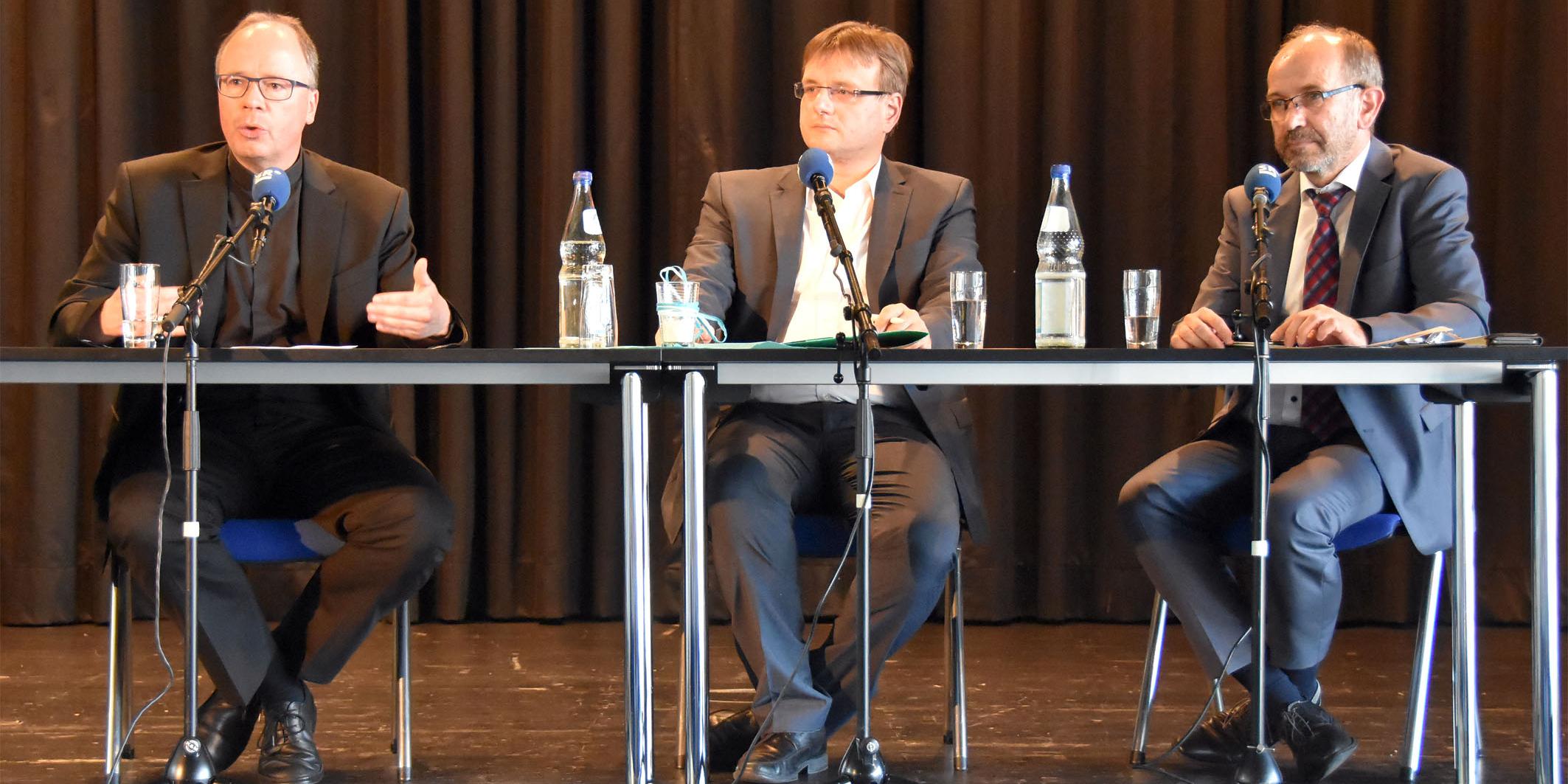 vlnr: Bischof Dr. Stephan Ackermann, Christian Otterbach, Präses Manfred Rekowski